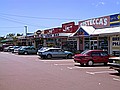 The shops at the end of the road.  Liquor store, chemist, butcher, baker, deli, veggie shop, coffee shop.  No need to ever leave the neighborhood!