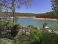 One of the reservoirs in the Stirling Hills.  All that red soil is supposed to be underwater, hence our current sprinkler bans.